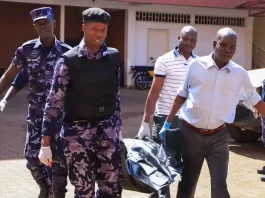 Police carrying dead body of the security guard