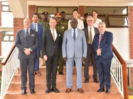 Hon. Vincent Bamulangaki Ssempijja, the Minister of Defence and Veteran Affairs (Grey suit) and General Wilson Mbadi, the Chief of Defence Forces with the EU Delegation. Courtesy photo