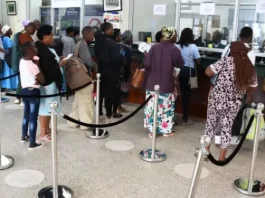 Travelers lining up at an Immigration office