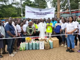 National Water and Sewerage Corporation team presenting the gifts to Rev. Fr. Vincent Lubega, the Rector at Namugongo Catholic Martyrs Shrine