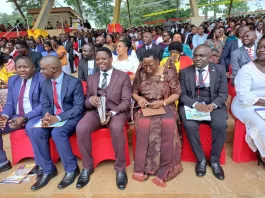 MPs Muhammad Ssegirinya and Betty Nambooze Bakireke attending mass at Namugongo Catholic Martyrs Shrine
