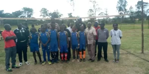 St. Kizito Sports Staff with Under 12 Volleyball team