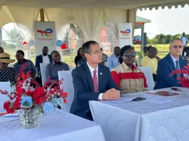 Dr. Ruth Nankabirwa, the Minister of Energy and Mineral Development (Center) with a team from Total Energies UG