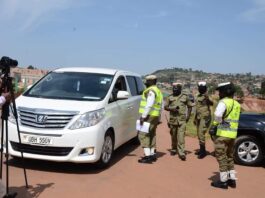 Traffic Police Officers inspecting a car