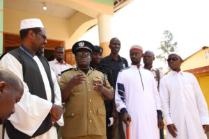 Mohammad Nourelhuda, the Direct Aid Society's Country Director with Hajji Sulaiman Karungi, the Commissioner of Police and the Muslim community at Nsambya Barracks in Kampala