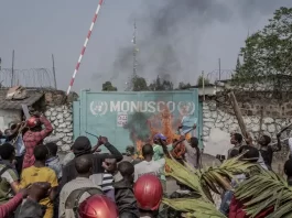 Congolese protesters set the MONUSCO signpost on fire