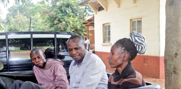The three PDM SACCO leaders from Namutumba District shortly after being arraigned before the Iganaga Chief Magistrate's court