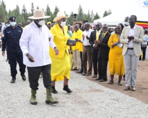 President Yoweri Museveni, Janet Museveni and Canon Dr. Henry Wamani (right).